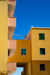 beautiful Procida island with colorful houses in sunny summer day, Italy