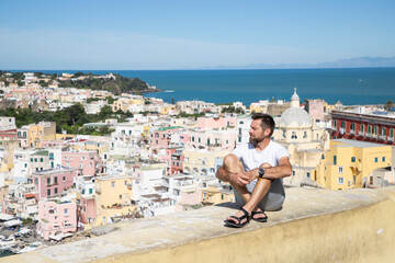 Obraz premium beautiful Procida island with colorful houses in sunny summer day, Italy