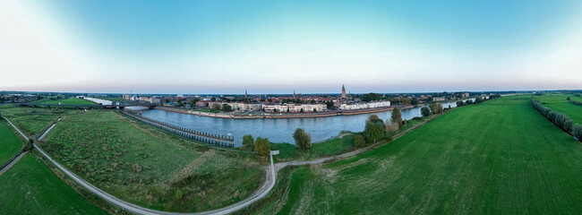 Floodplains and wide countenance panorama aerial of Zutphen in Netherlands seen from river IJssel...