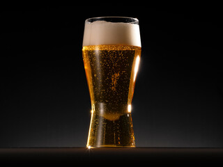 Glass of beer close isolated on black color background
