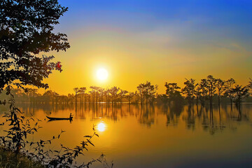 Naklejka premium Dawn on the flooded fields