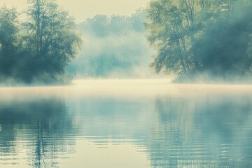 Fototapeta premium A serene lake reflects the soft morning light while mist gently rises from the water, creating a peaceful atmosphere. Generative AI