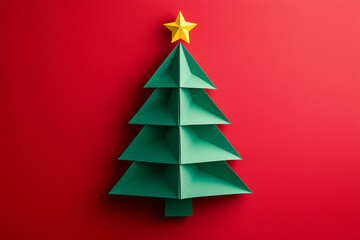 Minimal origami style folded paper christmas tree on red background. Greeting card concept.