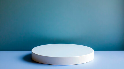 Empty circular jewelry display pedestal on plain background