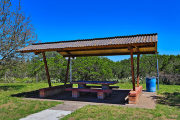An old picnic area along the roadway in the Texas Hill Country makes for a welcome sight, to stop and take a break on those long drives.
