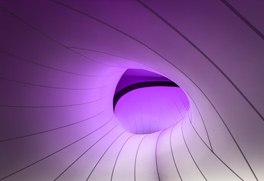 Exploring the theme of Abstract Architectural Design accentuated by the vivid purple lighting