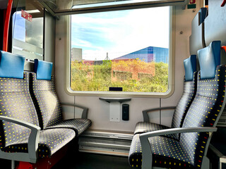 Interior of a train cabin with four seats