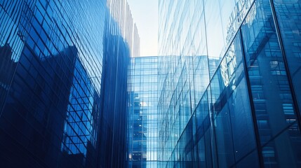 Fototapeta premium A city skyline with tall buildings and a clear blue sky