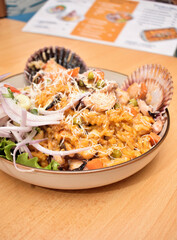 Fish ceviche and rice with seafood, traditional Peruvian dish of fish and seafood