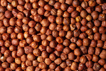 Scattered Peeled Hazelnut - Top View. Background from Hazelnuts. Natural High-Calorie Snacks