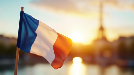 Wave of the French flag perfectly matched with Eiffel Tower, basking in the orange glow of a magnificent sunset, capturing iconic symbols of France in harmony.