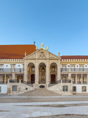 Entrance of courtyard and main building of the historic Coimbra University, the oldest university in Portugal and one of the oldest in Europe founded in 1290, Portugal. UNESCO world heritage site