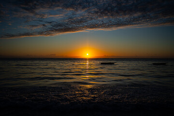 Obraz premium Boot im Sonnenaufgang