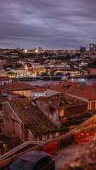 Moody twilight over Porto's Ribeira district with terracotta roofs and Douro riverfront
