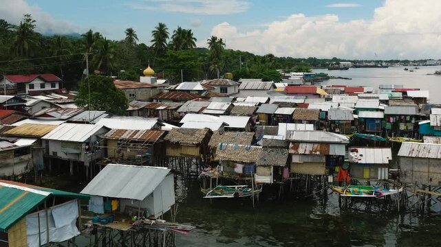 Pile dwellings of fishermen houses in Zamboanga seashore. Mindanao, Philippines.