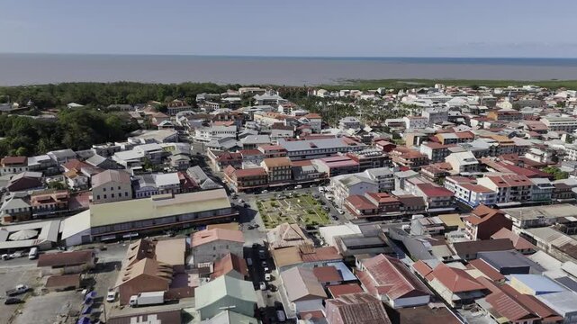 Drone descends on the Cayenne Market and Place du Coq in Cayenne, French Guiana, France