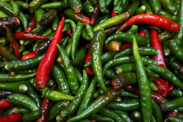 Green and Red Chili Peppers Background Image 