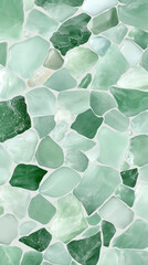 sea glass fragments in mint and emerald green tones creating natural mosaic pattern on white background