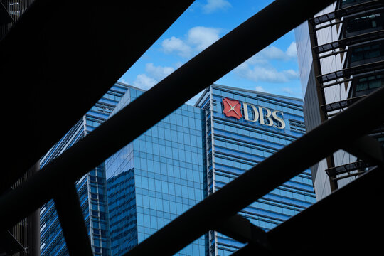 
Singapore &ndash; October 2024. The DBS logo atop of the DBS financial building at Marina Bay framed between the towers of the adjacent Marina Bay One building.