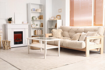 Interior of modern living room with comfortable sofa and table