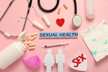 Composition with text SEXUAL HEALTH on pink background