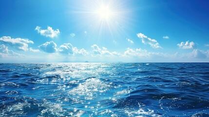 Fototapeta premium Blue Ocean with White Clouds and Sunlight