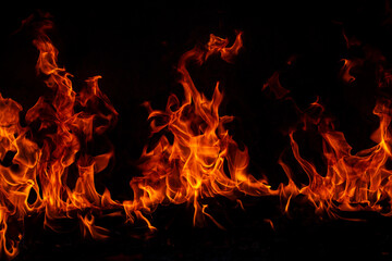 Fire flames on black background. Fire burn flame isolated, abstract texture. Flaming effect with...