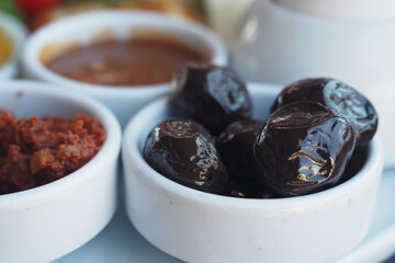 Gourmet Table Condiments Experience the Richest Flavors Elegantly Displayed in Small Bowls