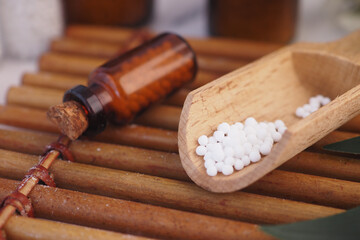 Homeopathic pills containers on a table 