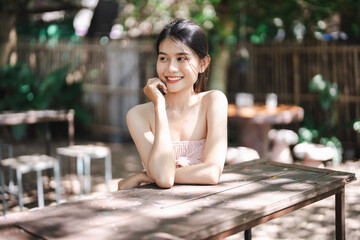 Portrait of Smiling Beautiful asian young woman wellness portrait outdoor happiness