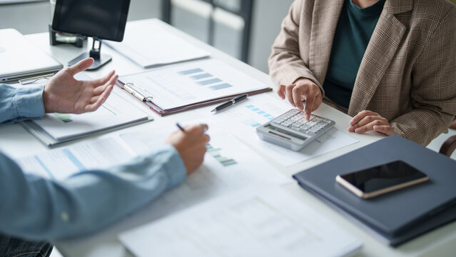 business man Auditor or internal revenue service staff checking annual financial statements company Audit  Accounting tax.