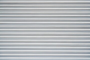 Obraz premium Texture of white metal roller shutter door Extreme Close-Up