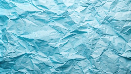 Obraz premium Textured light blue paper with creases at a tilted angle background