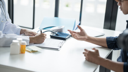 Medical Consultation Doctor Discussing Medication with Patient