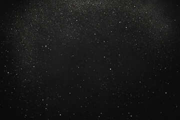 Obraz premium High-Resolution Black Background Texture with White Speckles for Vintage Film Effect and Retro Overlay Designs 