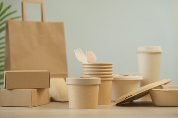 Environmentally friendly packaging, biodegradable materials, green packaging, recycling symbol,...