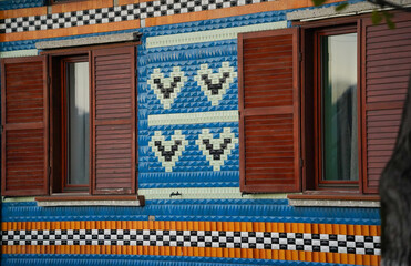 the house with traditional motifs. detail. the window of a house.