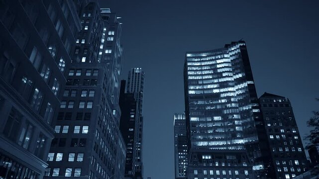 The modern urban skyline illuminated at night showcases a stunning array of buildings and lights