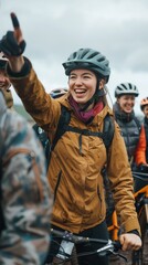 Fototapeta premium A woman in a yellow jacket and helmet points excitedly while smiling. AI.