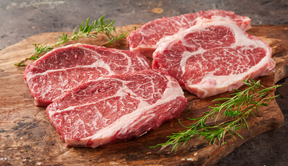 raw meat on a wooden board