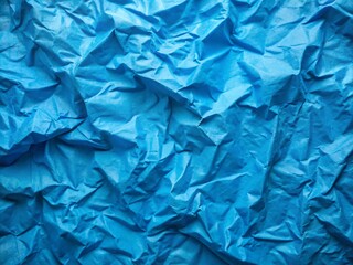 Obraz premium Blue Crumpled Paper Texture Background for Creative Design Projects