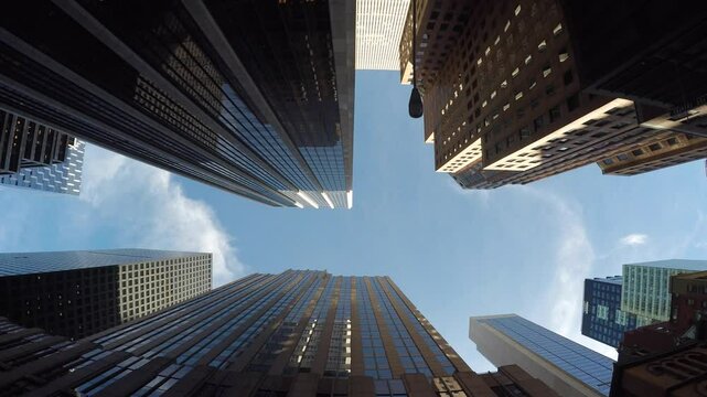 City skyscrapers rise tall in urban downtown, meeting the sky with majestic presence