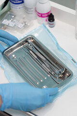 Dental instruments laid out for patient treatment in a modern clinic setting
