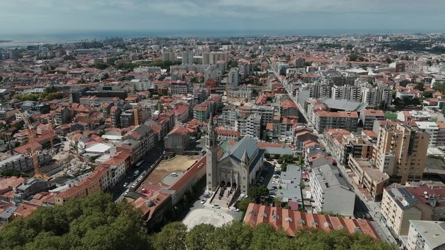 Aerial view of Igreja Paroquial Nossa Senhora da Concei&ccedil;&atilde;o in Porto, showing urban landscape