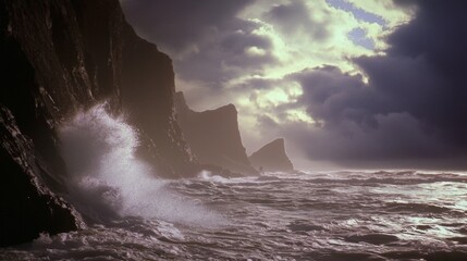 Obraz premium Majestic Coastal Landscape with Powerful Waves Crashing Against Rocky Cliffs under Ominous Storm Clouds and Sunset Glow