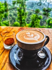 cup of coffee with cinnamon