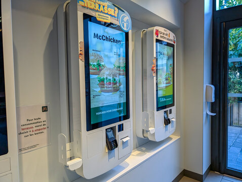 France, Bordeaux, 05 October 2024 : McDonald's self-order kiosks featuring McChicken and Royal Deluxe options