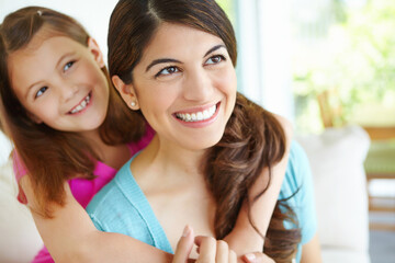 Smile, mom and piggyback child in family home for love, care and bonding together in living room. Happy girl, mother and hug kid for support, connection and trust single parent with foster daughter