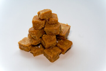 Close-up of fudge heap against white background. Photo taken October 26th, 2024, Zurich, Switzerland.