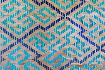  Samarkand, Uzbekistan - October. 10. 2024: Ancient patterns of the madrasah on Registan Square